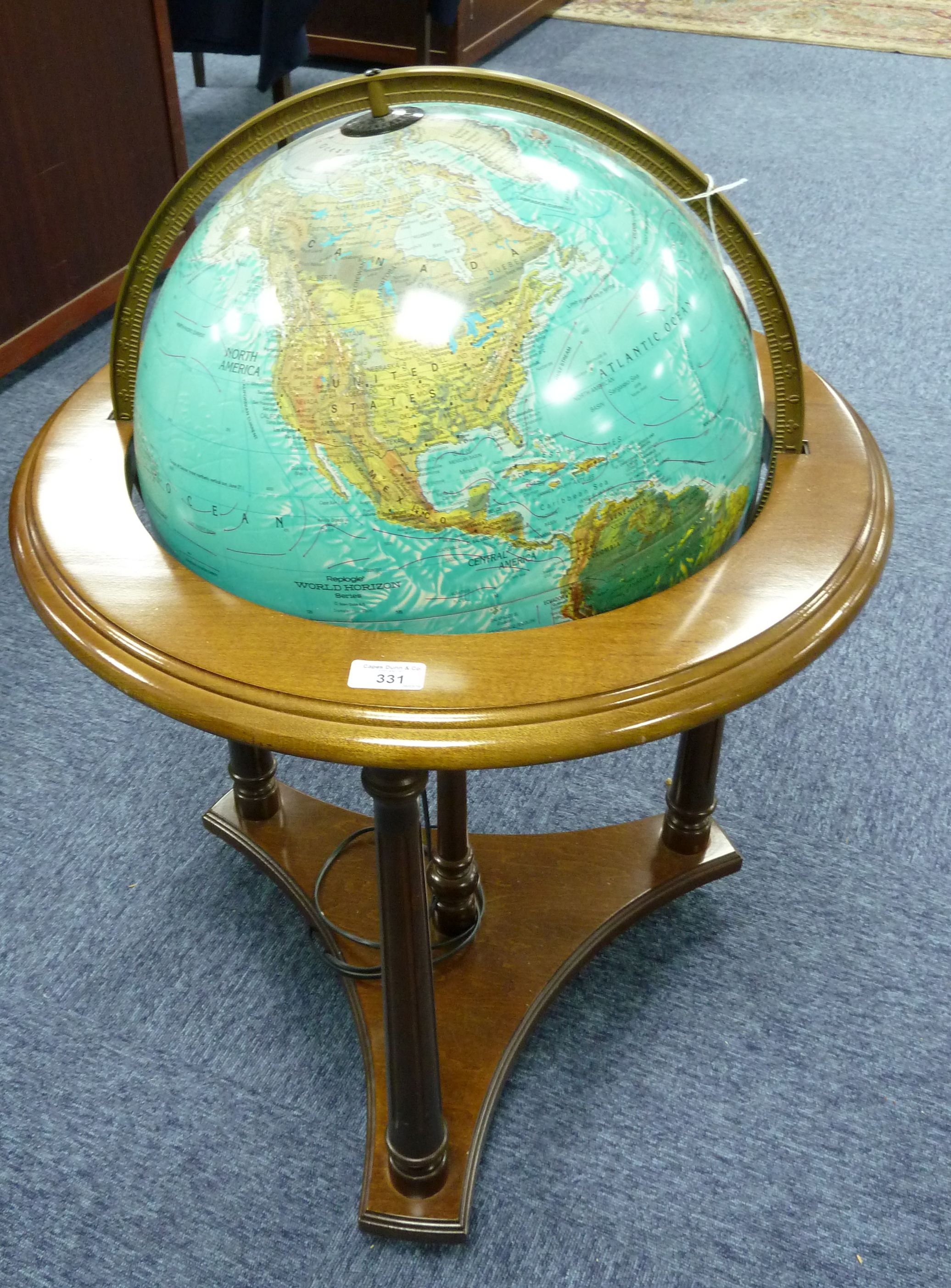 A modern mahogany stained beech wood framed FLOOR STANDING GLOBE with internal electric light