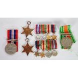 GROUP OF FOUR WORLD WAR II SERVICE MEDALS with ribbons, viz 1939/45 War Medal, Defence Medal, Africa