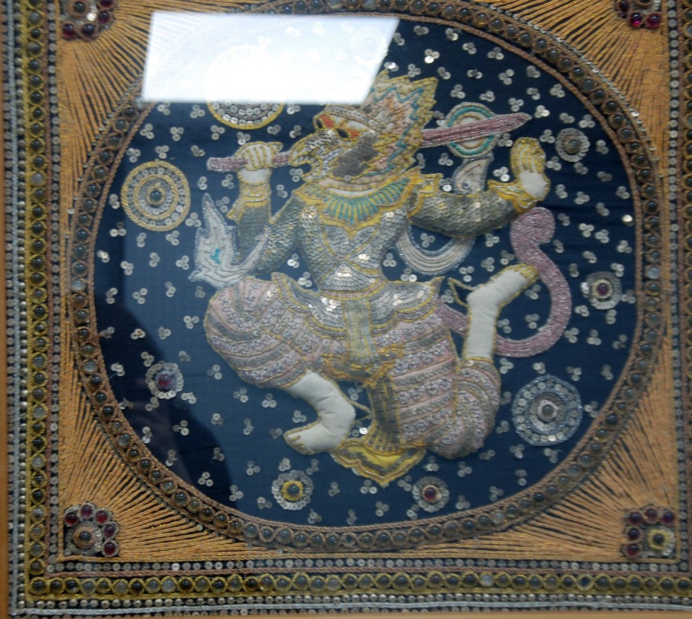 A NEAR PAIR OF TWENTIETH CENTURY INDO-PERSIAN HAND WORKED FABRIC PANELS, depicting Hindu Gods/ - Image 2 of 2