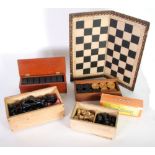 GOOD SET OF 28 BLACK BAKELITE AND SIMULATED IVORY DOMINOES, circa 1920s, in mahogany box with
