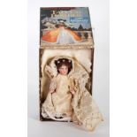 LATE VICTORIAN SMALL ALL BISQUE DOLL, fixed head with painted detail and brown wig, swivel arms