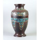 IMPRESSIVE LATE NINETEENTH CENTURY CHINESE BRONZE AND CLOISONNE VASE, of footed oviform with waisted