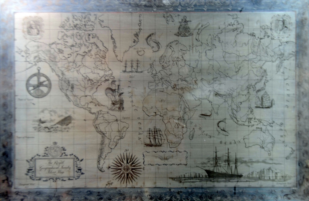 ROYAL GEOGRAPHICAL SOCIETY SILVER MAP OF THE WORLD, designed by Robin Jacques, 15" x 22 1/2" (38cm x