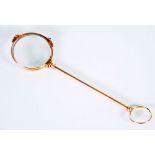 *PAIR LATE NINETEENTH/EARLY TWENTIETH CENTURY ROLLED GOLD LORGNETTE, the round lenses with pivoting