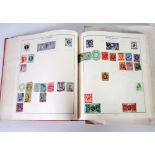 THE STRAND STAMP ALBUM CONTAINING A 19TH CENTURY AND LATER SPARSE collection of GB and World