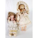 SMALL BISQUE SWIVEL HEAD DOLL, impressed 1000 13/0, having fixed brown eyes and open mouth showing