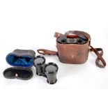 PAIR OF THOMAS ARMSTRONG AND BROS. MANCHESTER FIELD BINOCULARS No. 2879, in brown leather case,