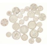 COLLECTION OF GEORGE V SILVER COINAGE to include 29 half crowns of which six only fine, 20 florins