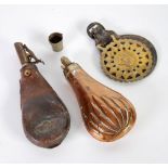 EMBOSSED COPPER POWDER FLASK, ANOTHER IN LEATHER (a.f.), HORSE BRASS with profile of Queen