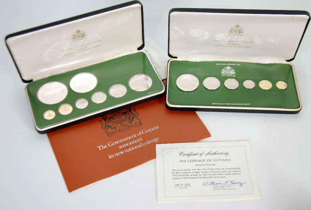 A 1976 COINAGE OF GUYANA, SIX COIN PROOF SET, 1 cent to 1 dollar, mounted by the Franklin Mint, in