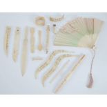 EARLY TWENTIETH CENTURY ORIENTAL CARVE AND PIERCED IVORY TWO PIECE PARASOL HANDLE, the narrow end