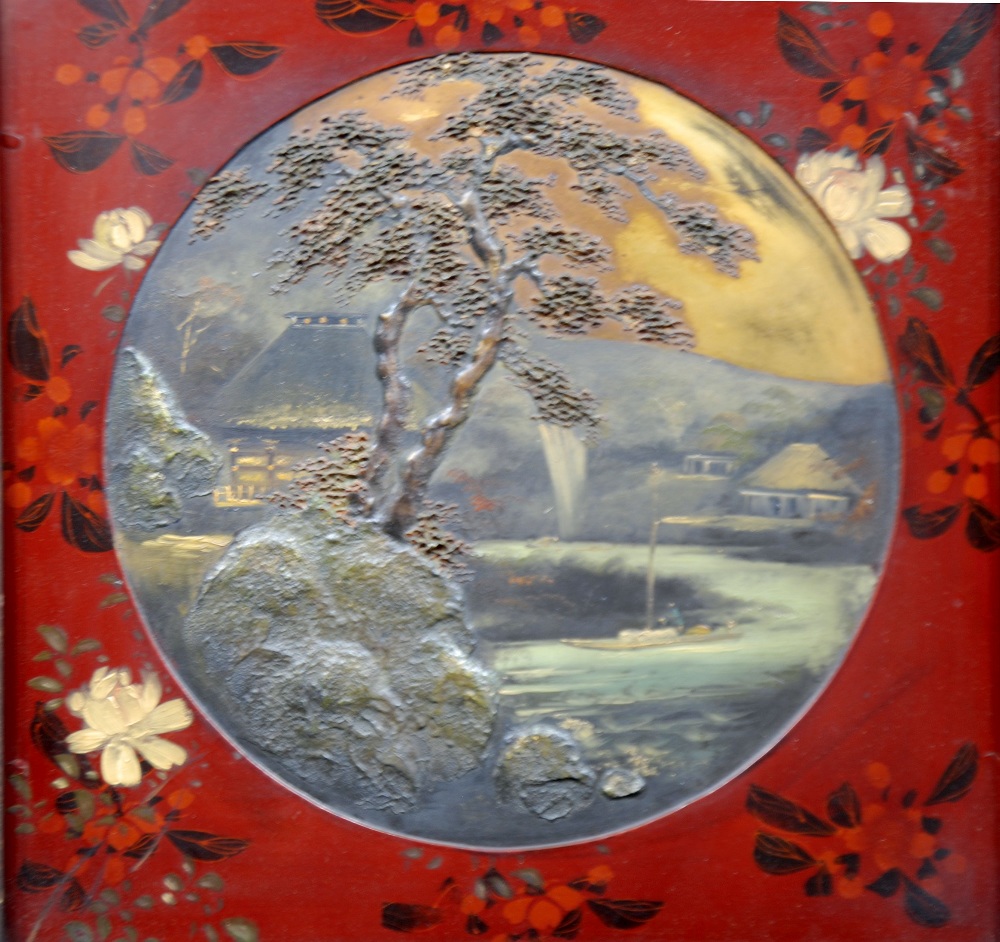 PAIR OF JAPANESE LACQUERED CIRCULAR PICTURES, with raised detail, each depicting a river scene