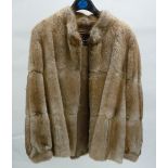 A LADY'S MUSQUASH FUR JACKET, supplied by Lawrence, Lord St. Southport