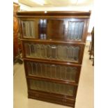 OAK GLOBE WERNICKE FOUR TIER SECTIONAL BOOKCASE WITH LEAD LIGHT FRONTS, THE TOP SECTION HAVING TWO
