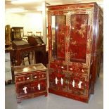 A MODERN ORIENTAL INSPIRED FURNITURE SUITE WITH RED AND BLACK VARNISH WITH APPLIED FIGURES IN MOTHER