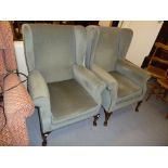 A PAIR OF HEAVY QUALITY SEMI WING FIRESIDE CHAIRS, RE-UPHOLSTERED IN GREEN PLUSH FABRIC AND RAISED