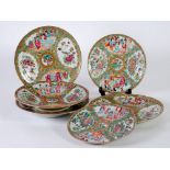 TWO CHINESE CANTON FAMILLE ROSE PORCELAIN DISHES, decorated with four reserves with interior