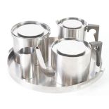 ARNE JACOBSEN FOR STELTON STAINLESS, FOUR PIECE CYLINDA-LINE DANISH STAINLESS STEEL TEA SET AND