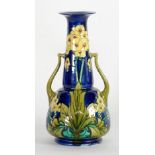 MINTON'S LTD., SECESSIONIST, TWO HANDLED VASE, tubed lined floral decoration, painted in tones of