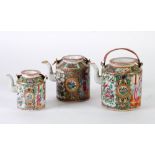 SET OF THREE EARLY TWENTIETH CENTURY CHINESE CANTON PORCELAIN GRADUATED TEA POTS, with cord