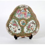 EARLY TWENTIETH CENTURY CHINESE CANTON FAMILLE ROSE PORCELAIN TRIANGULAR SHALLOW DISH, decorated