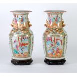 PAIR OF NINETEENTH CENTURY CHINESE CANTON FAMILLE ROSE PORCELAIN VASES, with embossed gilt serpent