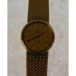 LADY'S 9CT GOLD CASED OMEGA DE VILLE QUARTZ WRIST WATCH, gilt dial with batons, on integral tapering
