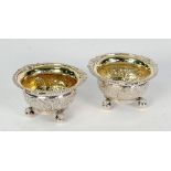 PAIR OF GEORGE IV IRISH SILVER LARGE OPEN SALTS, with gadrooned and shell capped rims and c-scroll