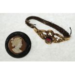 VICTORIAN WOVEN HAIR BRACELET WITH GARNET SET GOLD SCROLL FRONT, bezel set oval mixed cut garnet