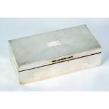 ENGINE TURNED SILVER CASED TABLE CIGARETTE BOX, with divided interior, Birmingham 1925, 7" x 3 ½"