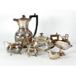 THREE PIECE ELECTROPLATED TEA SET, of rounded oblong form with angular scroll handles and scroll