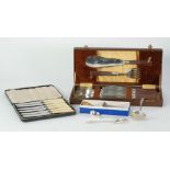 CASED SET OF SIX PAIRS OF FISH EATERS WITH SERVERS AND ELECTROPLATED CUTLERY, including cased set of