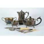 GEORGIAN STYLE THREE PIECE ELECTROPLATED TEA SET, with black insulator handle and finial AND AN