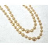 DOUBLE STRAND NECKLACE OF GRADUATED CULTURED PEARLS, 3.5mm-7.3mm diameter, with pearl set silver