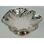 SILVER PEDESTAL CAKE DISH, hexagonal with cut card pierced wavy sides, on short waisted stem and