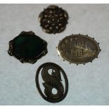 SCOTTISH SILVER MALACHITE SET BROOCH, with scroll frame, 4cm long; A SILVER TUDOR ROSE BROOCH,