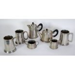 ROUNDHEAD PEWTER FOUR PIECE COFFEE SERVICE, planished detail with black handles WITH THREE PLANISHED