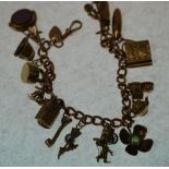 9CT GOLD CURB LINK CHARM BRACELET, with clip WITH SIXTEEN 9CT GOLD CHARMS, including A HARDSTONE SET