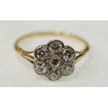 SEVEN STONE DIAMOND CLUSTER RING, 0.70ct approx. total carat weight, with trifurcated shoulders
