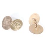 A PAIR OF 9CT GOLD DOUBLE OVAL CUFF LINKS, engraved with crest monogram, Birmingham 1984, 8.5gms