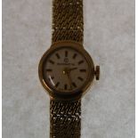 LADY'S 9CT GOLD CASED RODANIA WRIST WATCH, mechanical movement, baton dial, on integral tapering