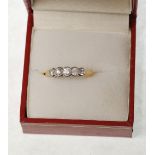 18ct GOLD RING, COLLET SET WITH FIVE DIAMONDS, graduating from the centre, 3.5gms, the centre