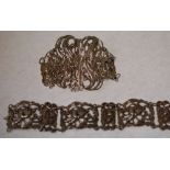 EDWARDIAN SILVER BRACELET, CONVERTED FROM A BELT, openwork and foliate design with large buckle