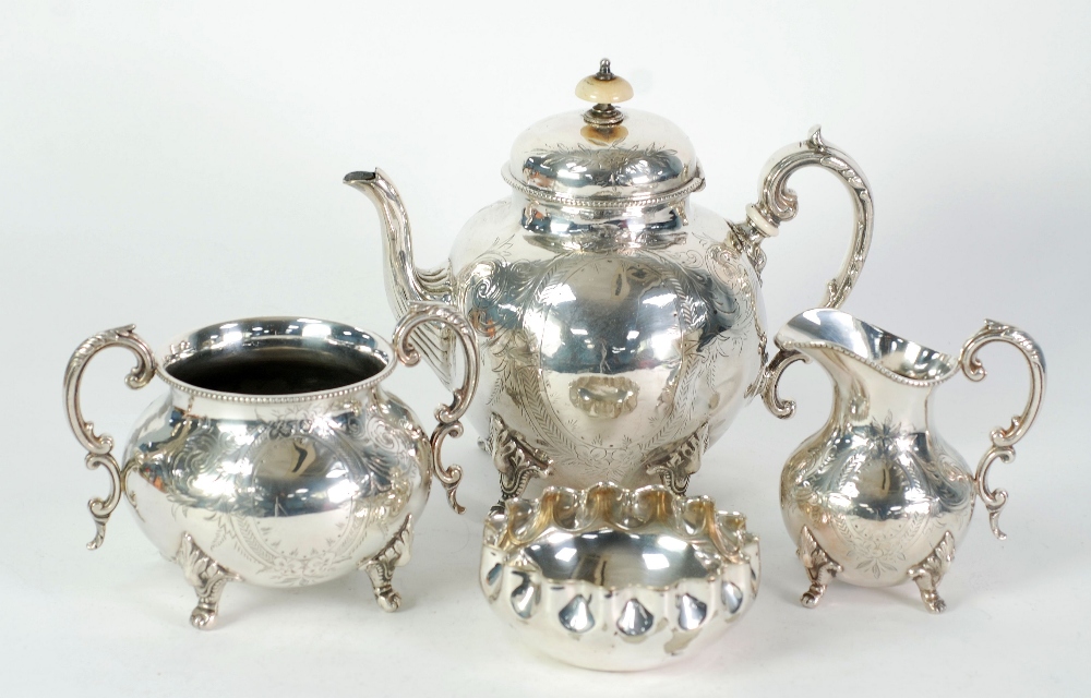 THREE PIECES OF VICTORIAN ELECTROPLATED TEA SET, of orbicular form with scroll handles, bone knop