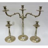 BRIGHT METAL THREE LIGHT CANDELABRUM with two screw-on rococo 'S' scroll branches and cast leaf