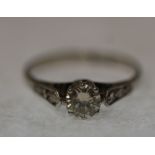 SOLITAIRE DIAMOND RING, claw set round brilliant cut diamond 0.42ct approx., each shoulder set