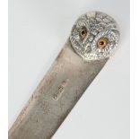 LARGE EDWARDIAN SILVER OWL PATTERN LETTER OPENER, with cast owl head finial with glass eyes,