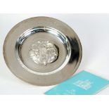 SILVER TUDOR DISH, with embossed Tudor rose to the centre, engraved with presentation inscription,