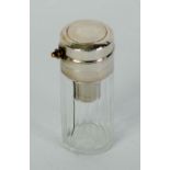 GENTLEMAN'S EDWARDIAN SILVER MOUNTED GLASS COLOGNE ATOMISER, cylindrical with silver push button