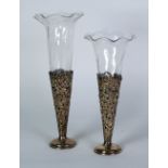 PAIR OF VICTORIAN PIERCED SILVER TRUMPET VASES WITH GLASS LINERS, pierced with c-scrolls and